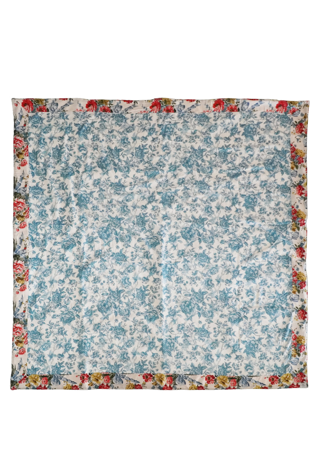 Floral patterned fabric square with a colorful border on a white background