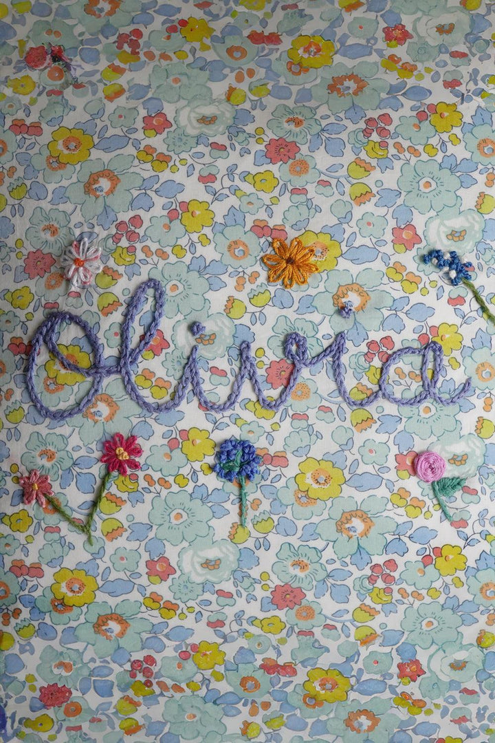 Coco & Wolf x Polly Wren Studios Olivia Embroidered Ruffle Cushion made with Liberty Fabric BETSY SAGE & FLORAL EVE